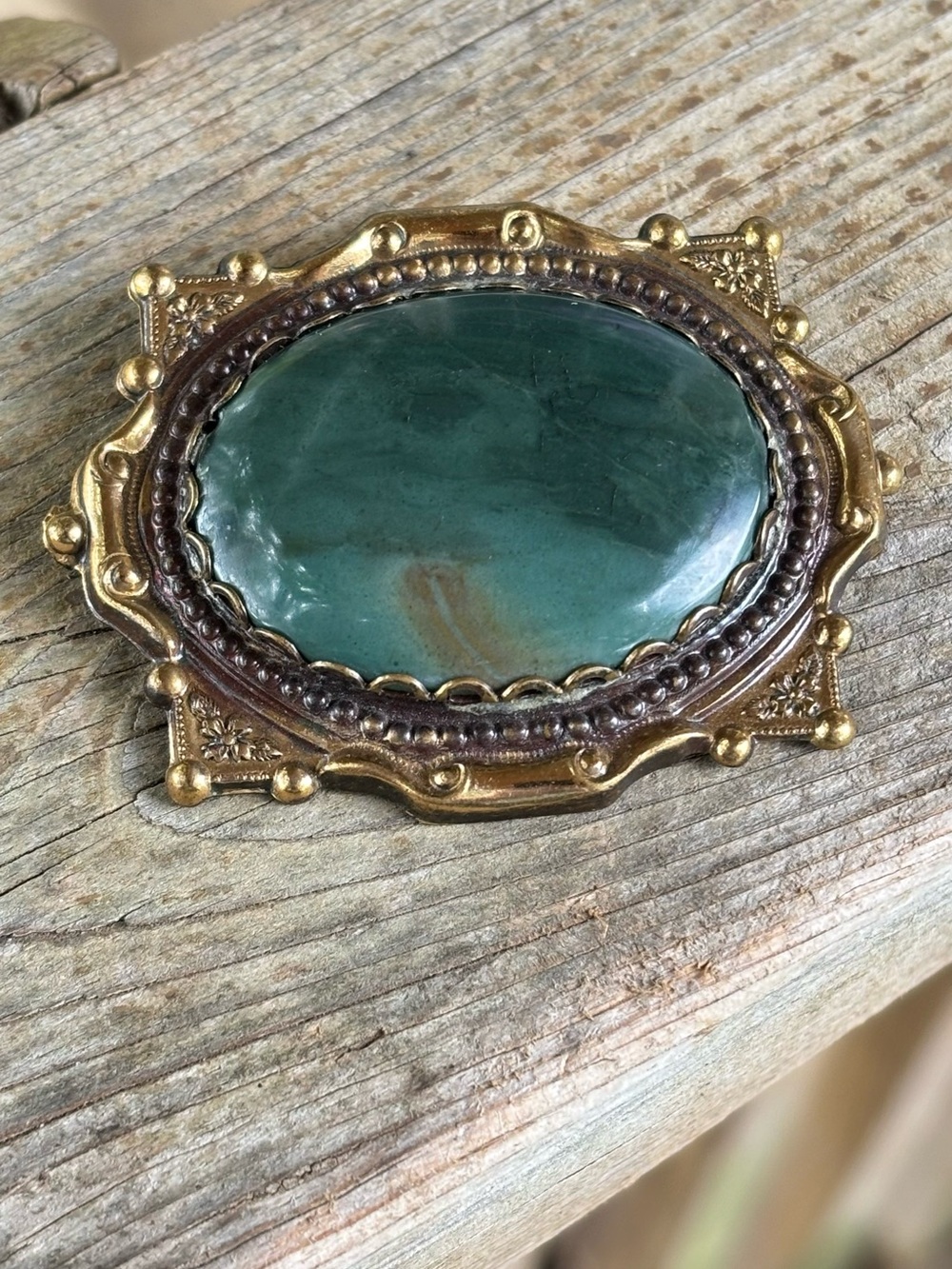 Unusual green glass brooch